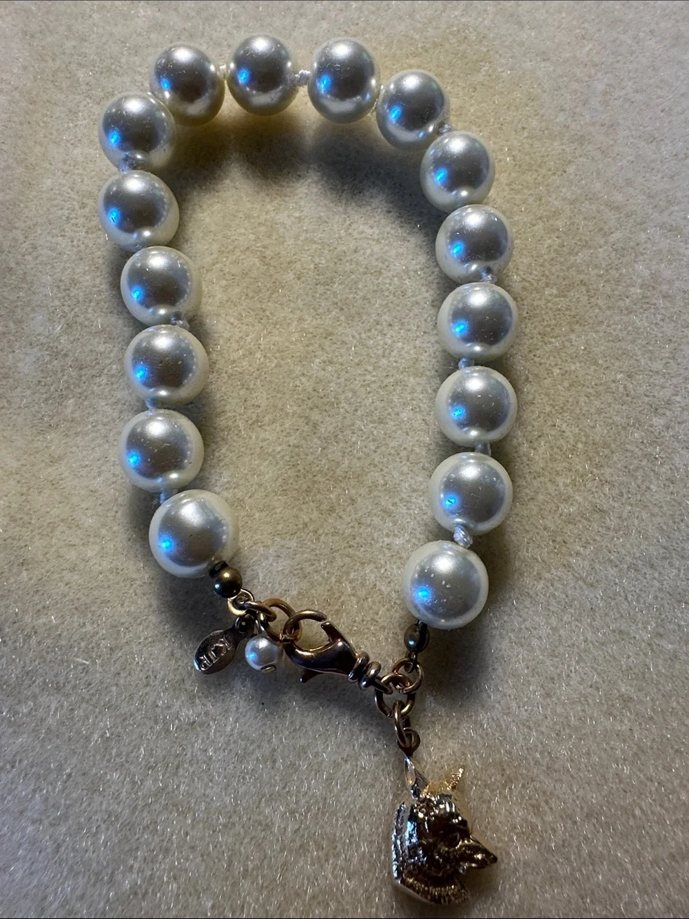 Kiel James Patrick Teal Pouch with Pearl Bracelet and Fox Charm Earrings